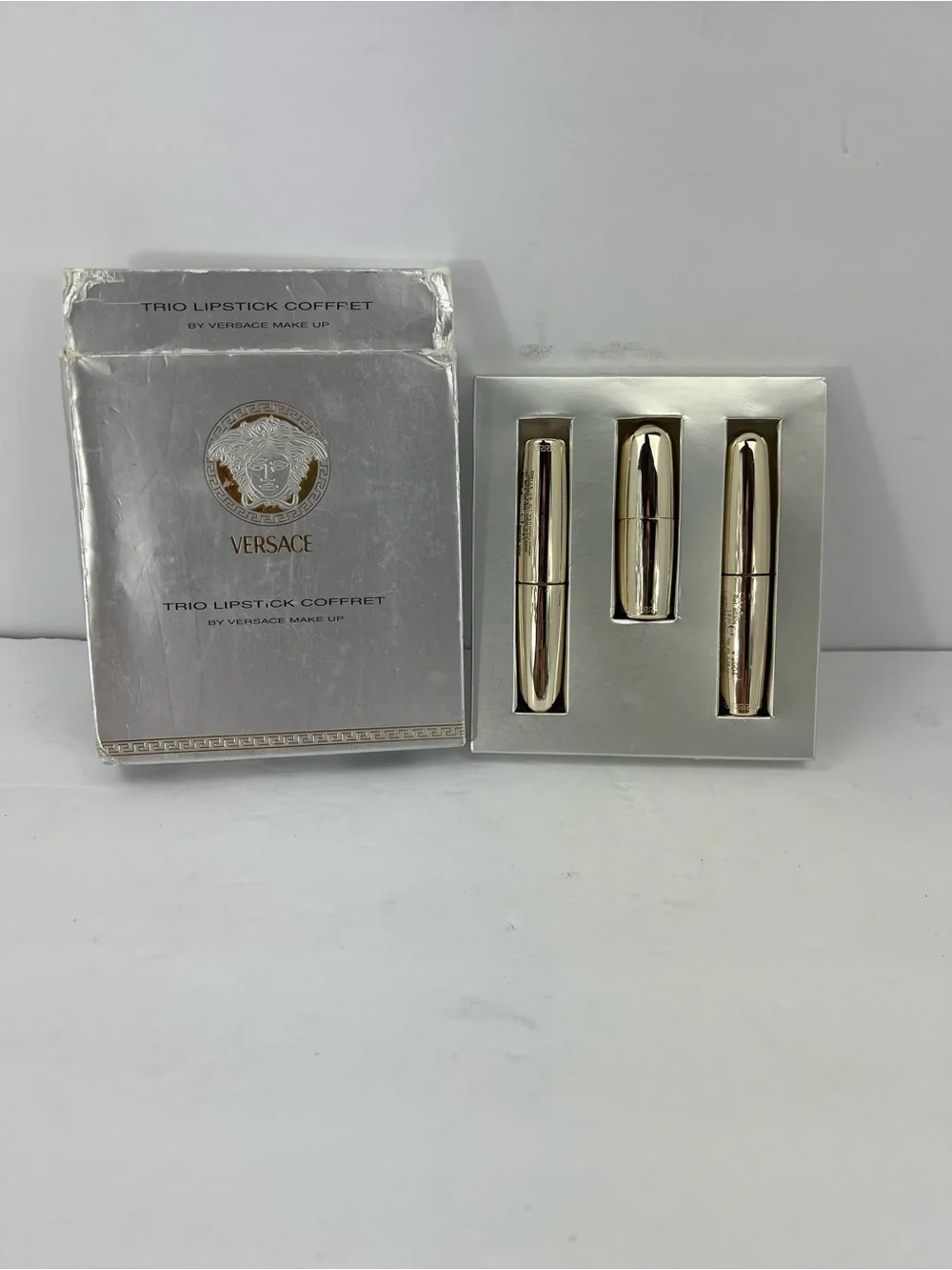 VERSACE TRÍO VINTAGE LIPSTICKS COFFRET SET WITH MEDUSA LOGO, IN GOLD COLOR